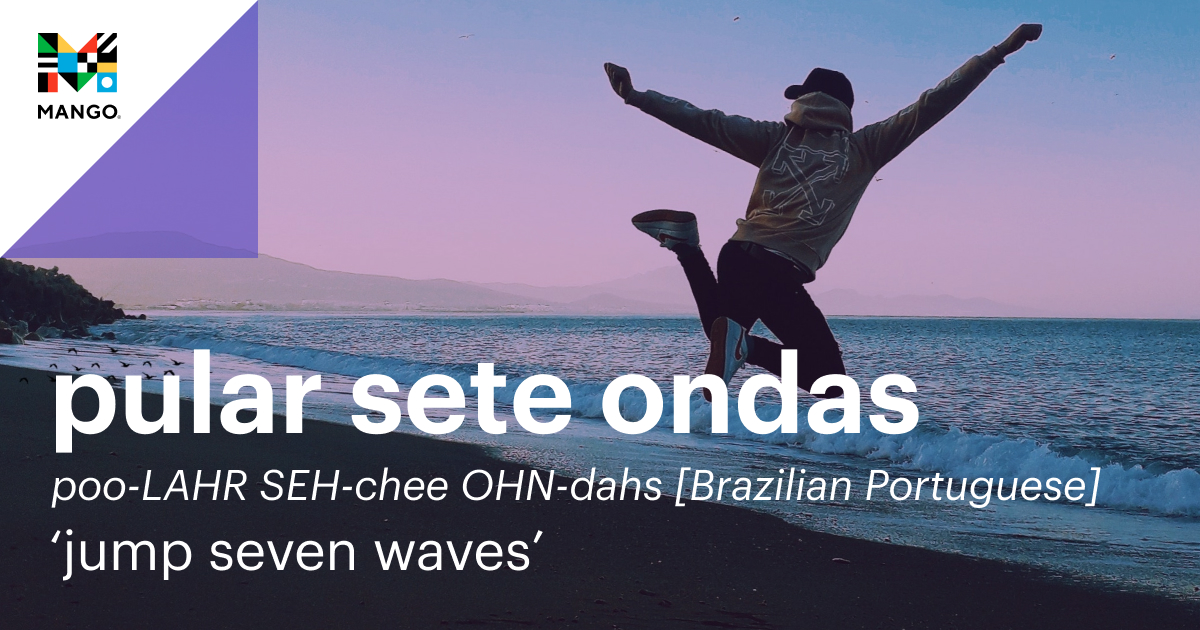 An image of a person jumping into the ocean, with the Brazilian Portuguese phrase 